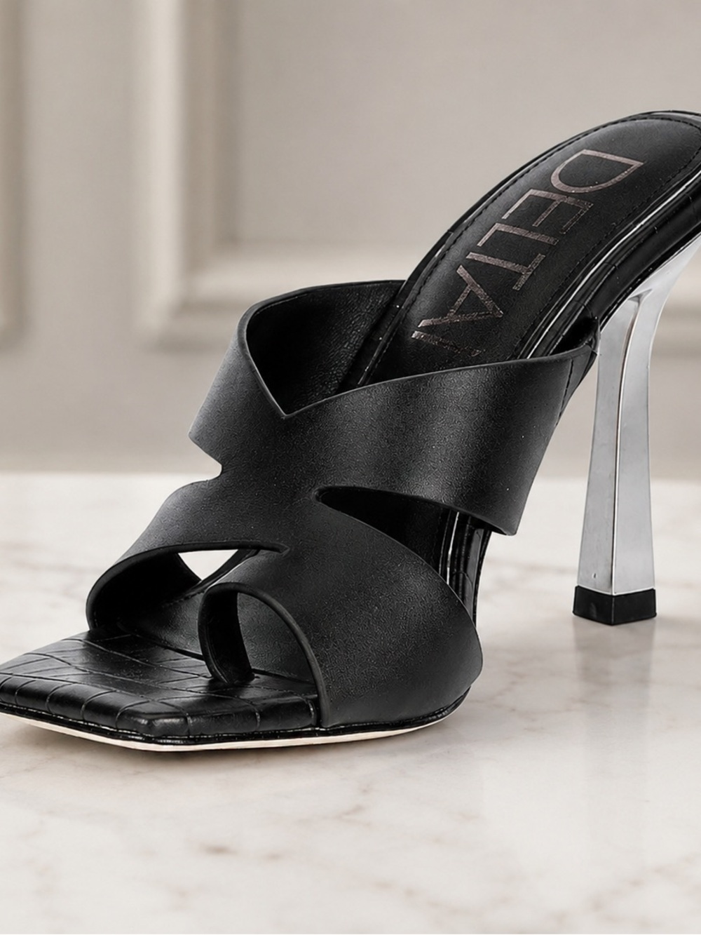 Deltan Black Strappy Mule Heels with Sculptural Metallic Heel